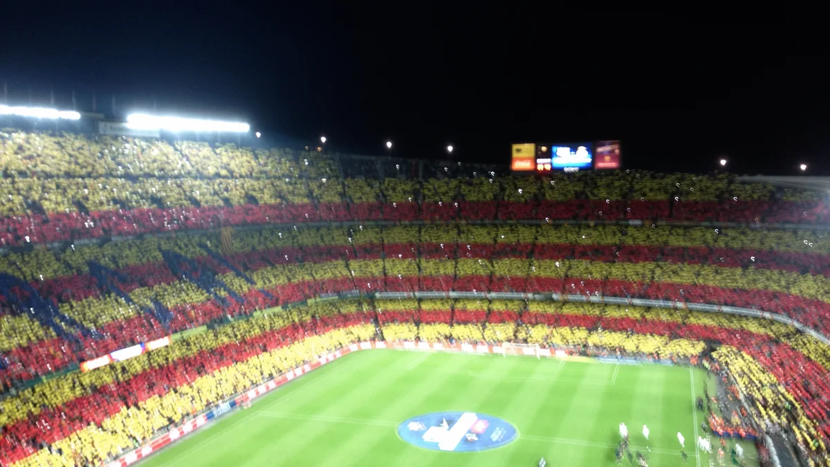 A packed Camp Nou with a tifo in FC Barcelona colours during a Clásico against Real Madrid